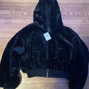 A all black furry jacket